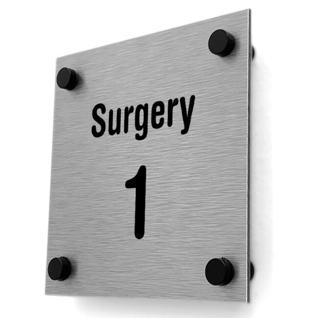 Icon sign with surgery 1 in steel on black