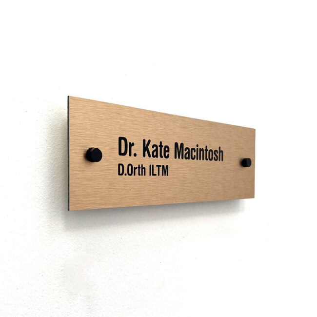 Name sign in bronze on black button fixings