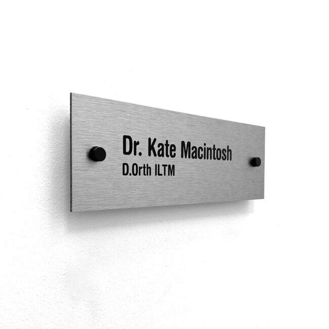 Name sign in steel on black button fixings